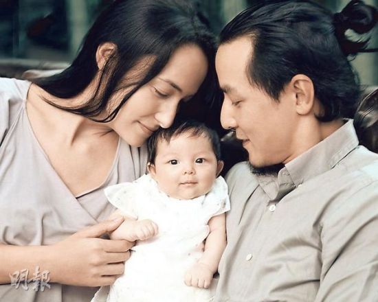 吴彦祖夫妇与女儿(资料图)