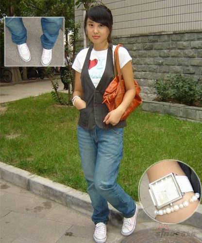 组图:精彩镜头 街头美女省钱招夏装秋穿