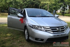 锋范1.5丝缎银自动精英提车