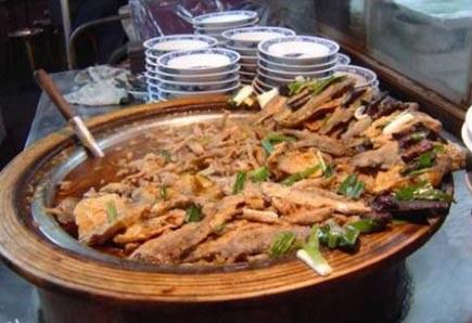 中国河南开封特色菜:煎扒鲭鱼头尾