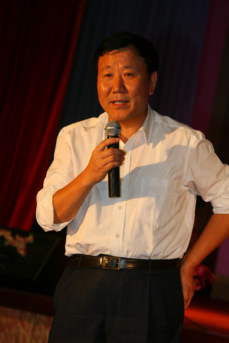 汇源老总是谁_汇源果汁老总图片