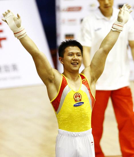 图文-体操世界杯上海站陈一冰吊环夺冠 开心致