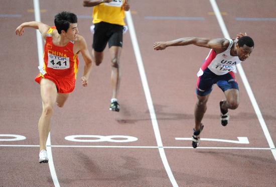 图文-田径世锦赛110米栏刘翔夺冠这样轻松的冲线