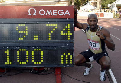 9秒74 鲍威尔再破百米世界纪录(图)_其他栏目