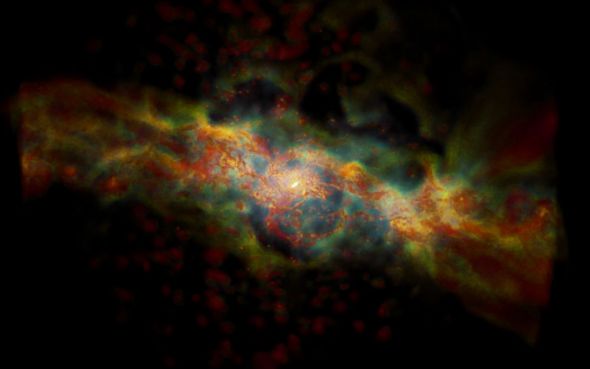 这是一个具备恒星新生区的星系模拟图像。新生恒星驱动剧烈的星风，图像上用绿色和青绿色表示。