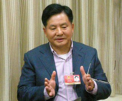 重庆移动公司原总经理沈长富(新浪科技配图)