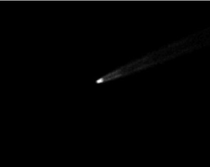 　　模拟彗星。在计算机的帮助下，研究者可以计算出彗星尘埃彗尾的形成。该图是2013年10月16日的模拟结果。