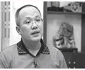 《境外热钱研究》课题组负责人黎友焕。