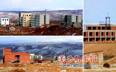 清水河新城区——一幢幢烂尾楼在坡地上晒太阳。 新华社发