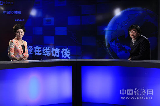 CCTV证券资讯执行总编辑、首席新闻评论员钮文新做客中经在线访谈 中国经济网王泽彪摄