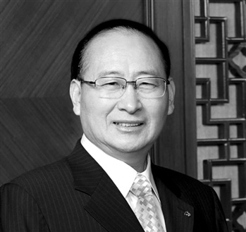 图为交行董事长牛锡明