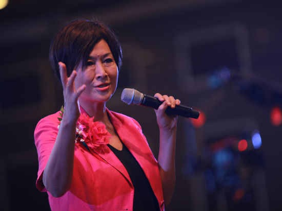 “第十一届学习型中国-女性成功论坛”于2014年8月22日-24日在北京召开。上图为台湾著名作家、台湾100大女性企业家陈艾妮。(图片来源：新浪财经 梁斌 摄)