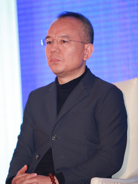 由《中外管理》杂志社主办的“第23届中外管理官产学恳谈会”于2014年11月1日-3日在北京召开。上图为金蝶国际软件董事长徐少春。(图片来源：新浪财经 梁斌 摄)