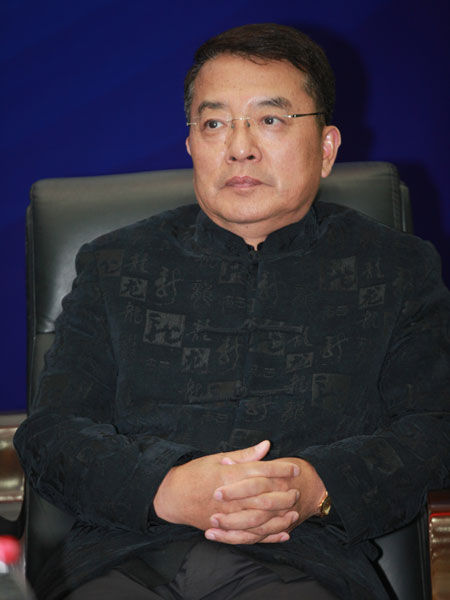 “经济新常态与改革新开局——董辅礽先生学术思想研讨会”于2014年11月15日在武汉举行。上图为北京大学光华管理学院研究员陈浩武。(图片来源：新浪财经 梁斌 摄)