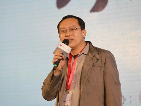 “2014中国青年天使会年度峰会”于11月25日在北京召开。上图为OK Coin创始人徐明星。(图片来源：新浪财经 梁斌 摄)