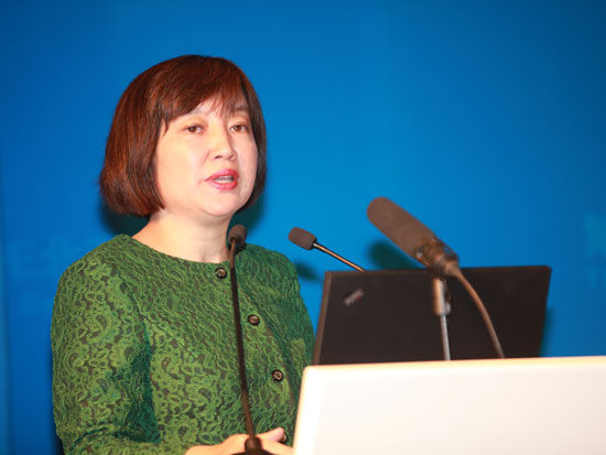 “第六届全球PE北京论坛”于2014年12月6日在北京召开。上图为中金公司首席经济学家梁红。(图片来源：新浪财经 梁斌 摄)