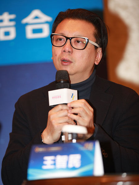 由《中国企业家》杂志社主办的“2014(第十三届)中国企业领袖年会”于12月12日-14日在北京举行。上图为星创视界董事长王智民先生。(图片来源：新浪财经 梁斌 摄)
