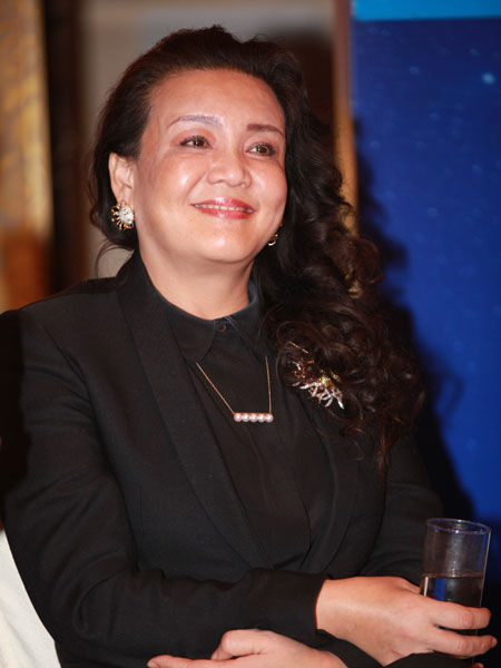 由《中国企业家》杂志社主办的“2014(第十三届)中国企业领袖年会”于12月12日-14日在北京举行。上图为俏江南投资有限公司董事会主席张兰。(图片来源：新浪财经 梁斌 摄)