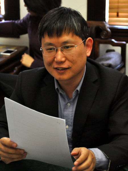 “金融极客汇”第二期——“信用的无限畅想”沙龙于2014年12月5日在上海举行。上图为FICO分析和业务咨询总监周立勇。(图片来源：新浪财经)