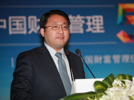 中国财富管理50人论坛第三届年会于2015年1月30日在北京召开。上图为CWM50理事、光大银行资产管理部总经理张旭阳。(图片来源：新浪财经 梁斌 摄)