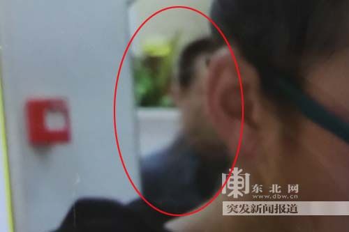 小蕾拍摄到犯罪嫌疑人半张脸。东北网记者 王忠岩 摄  　