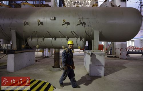 　　资料图片：北京京西燃气热电有限公司正在发展燃气热电项目，以减少煤炭使用。图为该公司天然气储存设备。