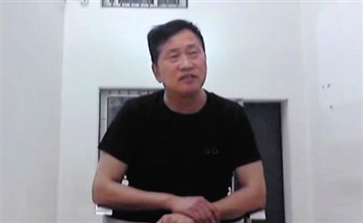 犯罪嫌疑人周世锋。警方供图