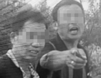 打交警男子（右）事发时气焰嚣张