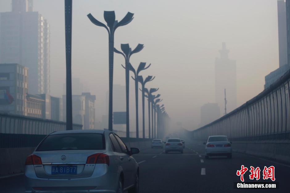 乌鲁木齐雾霾袭城 高楼"隐身"_高清图集_新浪网