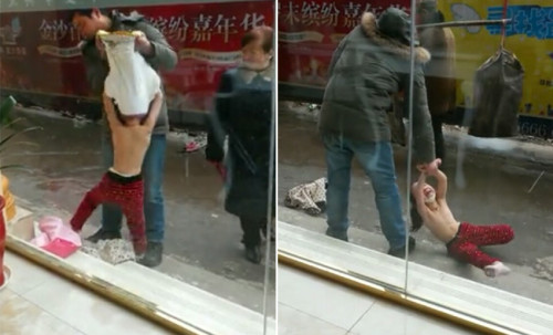 男子雨天扒光5岁女儿上衣当街拖行(图)
