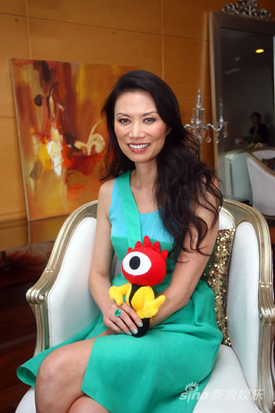 心机女王爱时尚 邓文迪造型进化史(图)