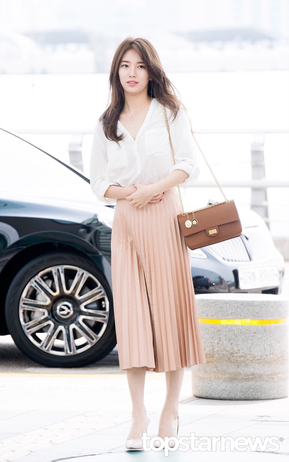 键翻阅图片 列表查看 大图 全屏观看 1 / 9 9月12日,裴秀智现身机 