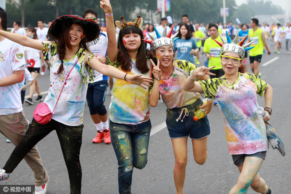 6000选手感受马拉松缤纷跑 彩色激情洋溢赛场_高清图集_新浪网