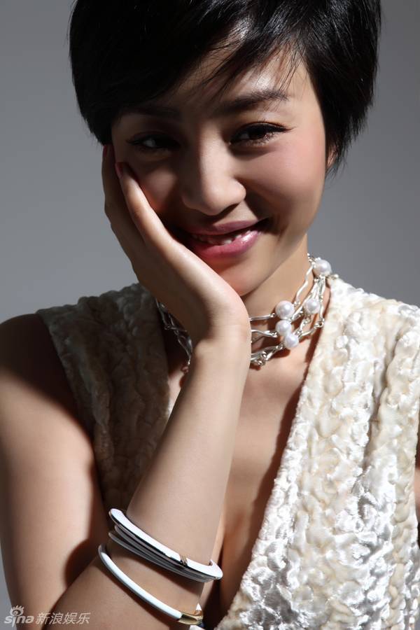 组图:俏姐张龄心推写真老练成熟御姐look_高清图集_新浪网