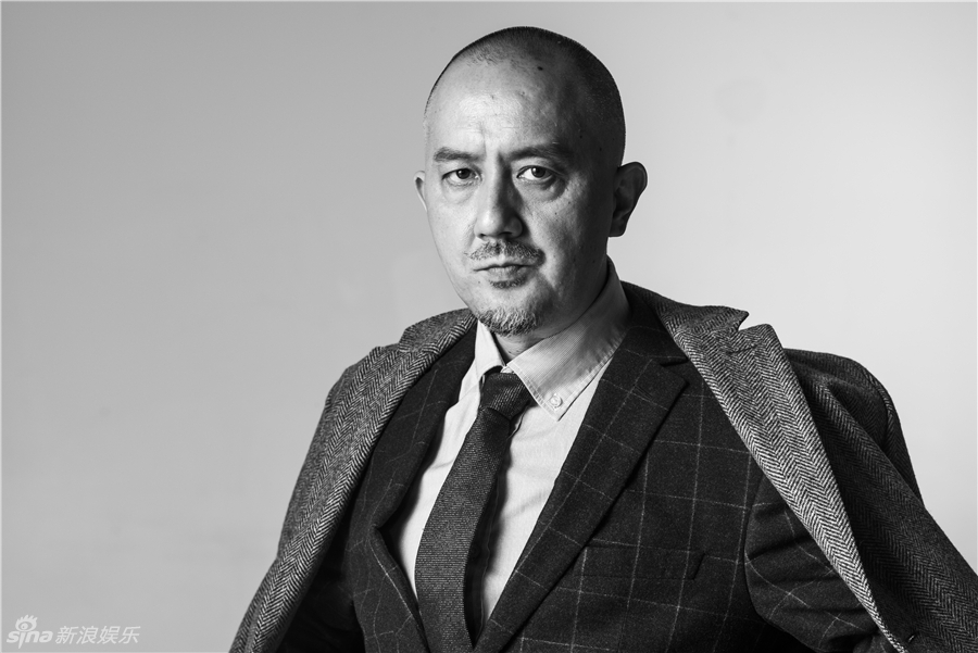 组图:姚橹全新宣传照曝光 风衣着装沉稳大气_高清图集_新浪网