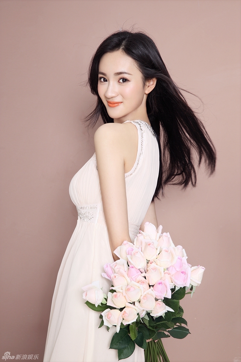 组图:陶洋浅笑嫣然拍写真 长发飘逸纱裙柔美_高清图集_新浪网