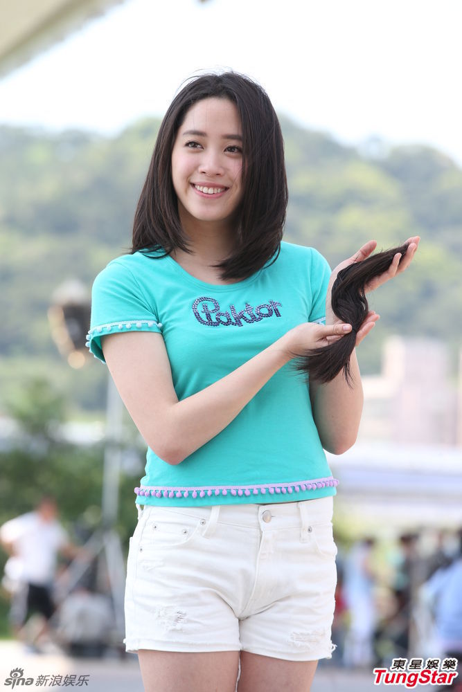 欧阳妮妮忍痛剪20公分长发 勇跃大银幕