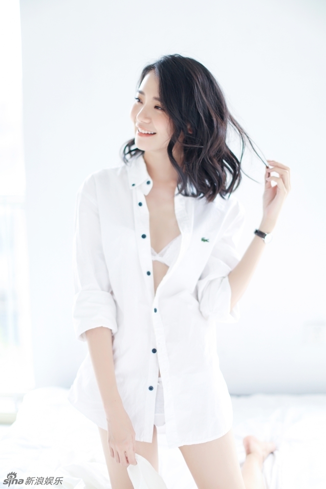 组图:杨子祯小露性感 衬衣写真笑颜如花_高清图集_新浪网