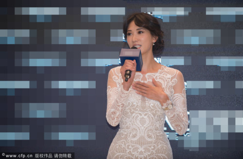 林志玲穿蕾丝裙美艳捞金