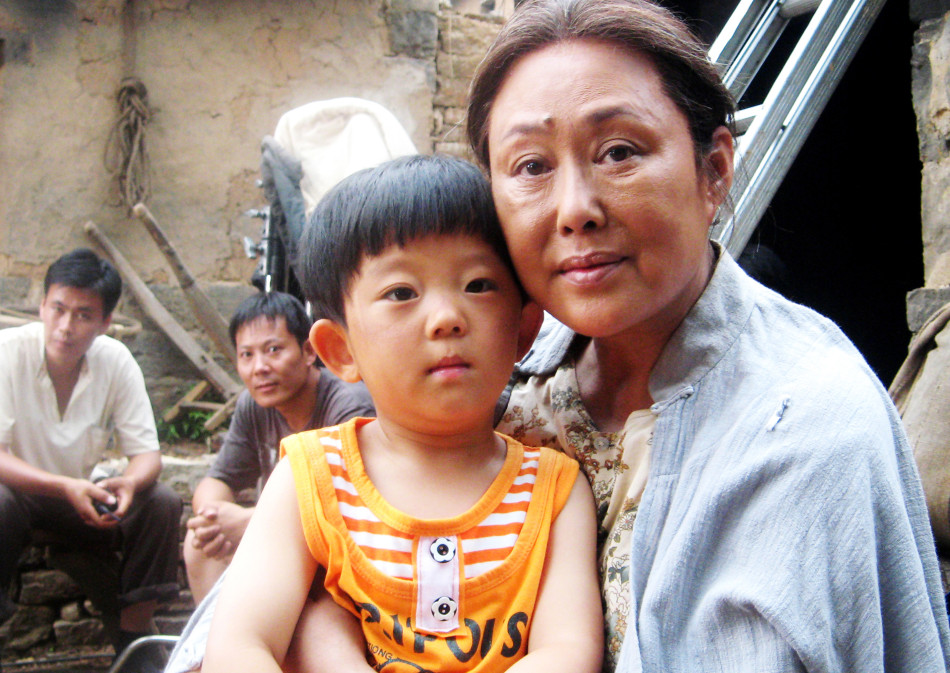 大牌明星与小童星合影