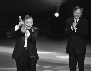 徐立功(左)与李安(右)