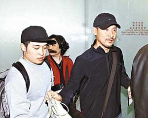 曾志伟的幼子曾国犹（左）。