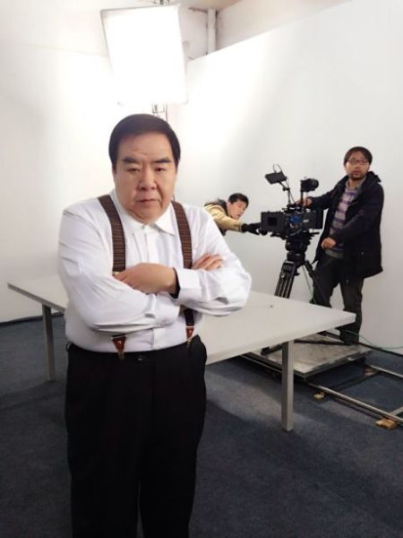 郑则仕拍广告再现经典"肥猫"造型(图)