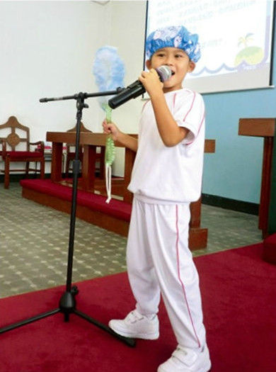 12年，陈锦鸿爱子驾桦在幼稚园毕业礼上表演个人朗诵