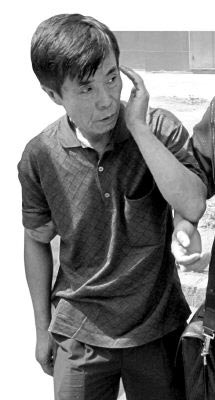 资料图片：何庆魁