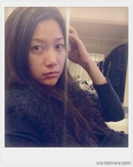 徐静蕾慵懒素颜照