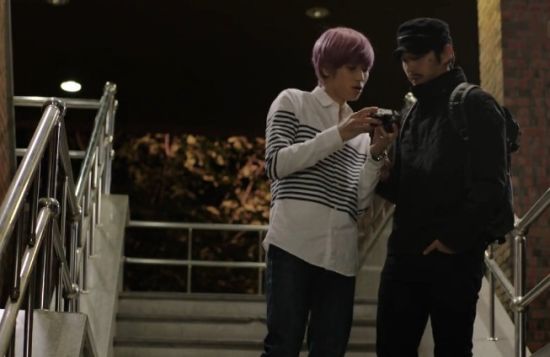 张泰山终于从大学生手中拿到有文一石犯罪证据的相机