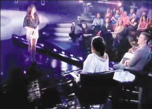 张靓颖在节目现场全程用英文与奥普拉交谈