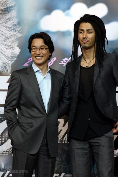 韩石圭(左)与车承元