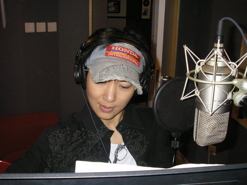 周彦宏尝试动感路线 重金打造奥运新歌曲(图)